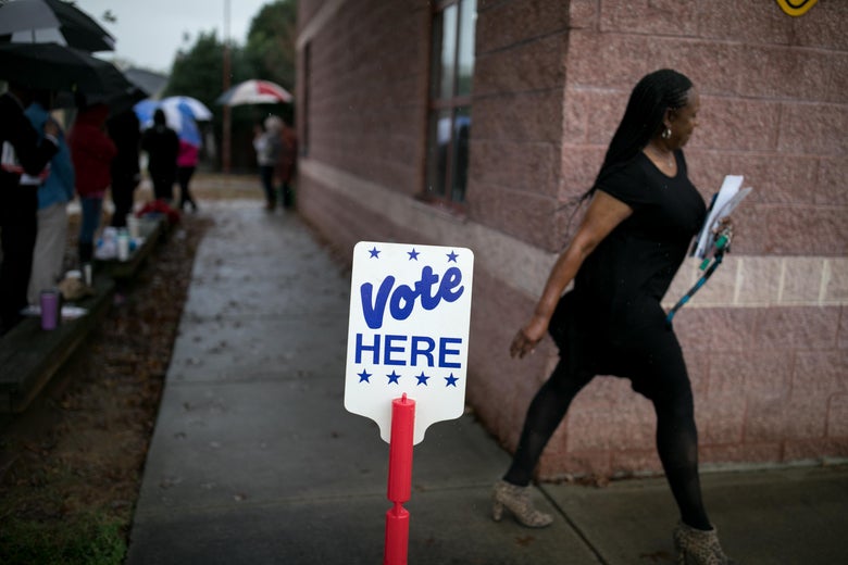 Residents of Charlotte, North Carolina, arrive at a polling station to vote on November 6, 2018.